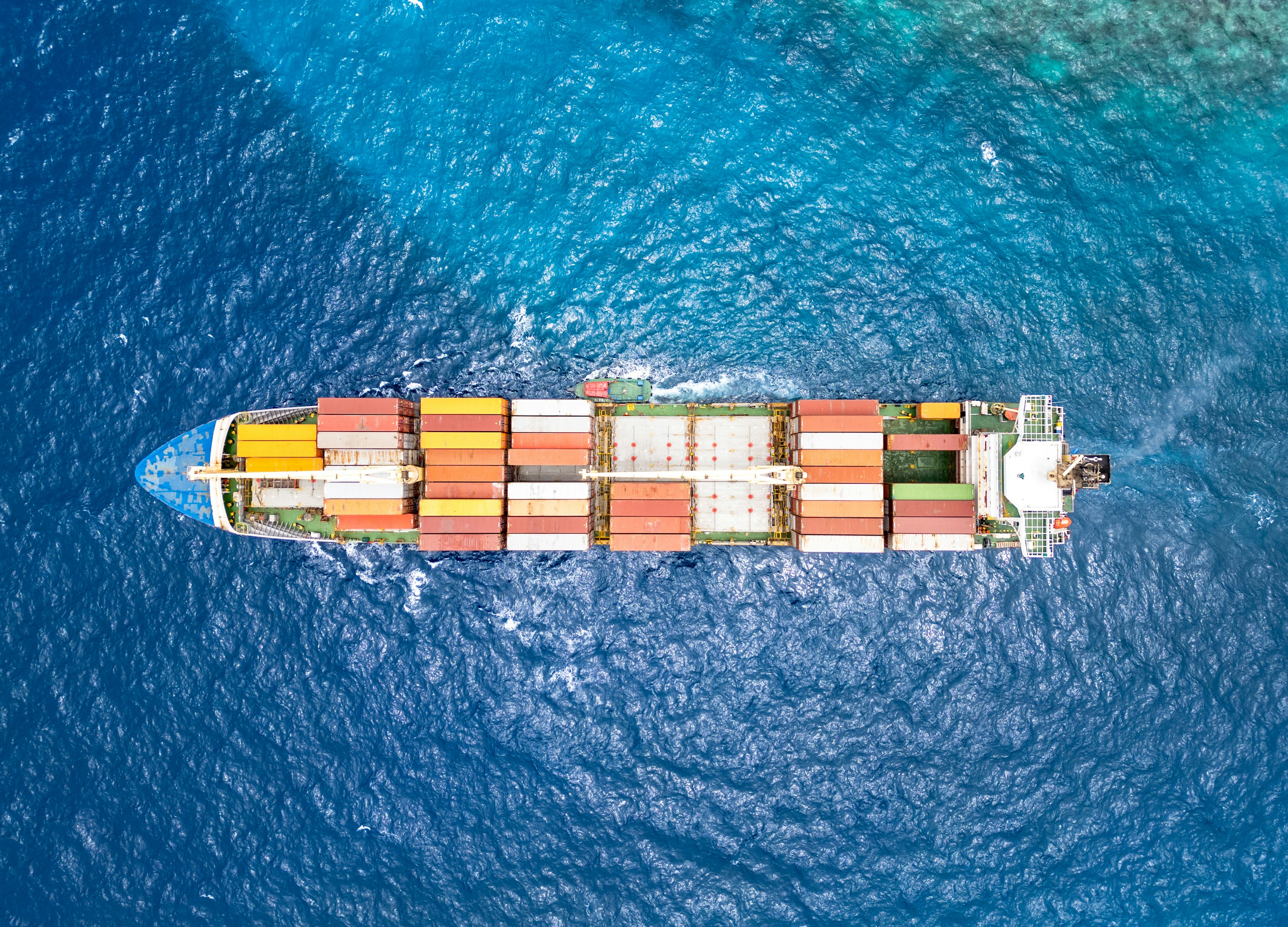 Illustrative view of a merchant cargo vessel at sea